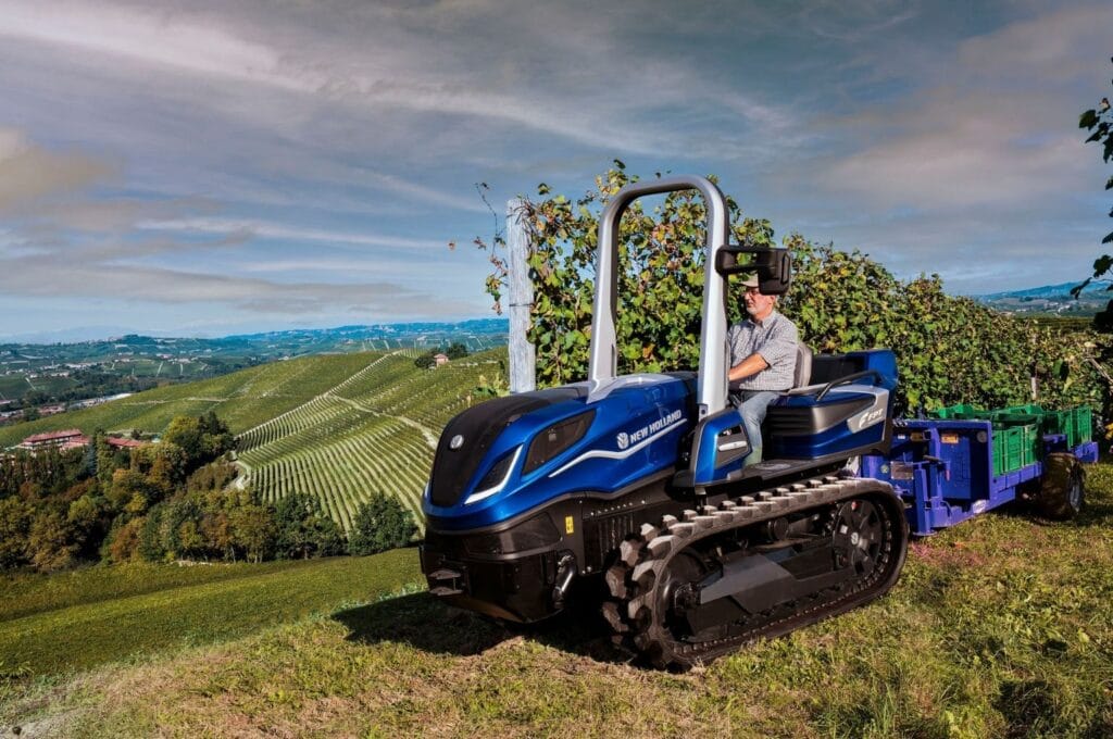 New Holland behind the wheel
