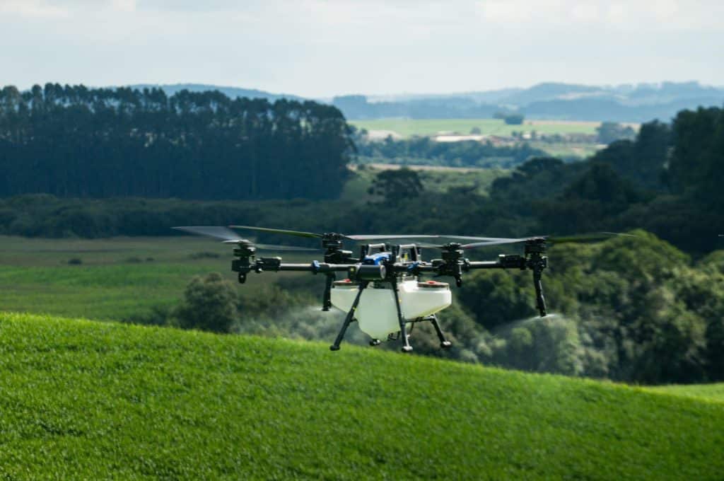 New Holland P spraying drone