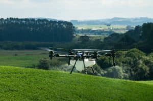 New Holland P spraying drone