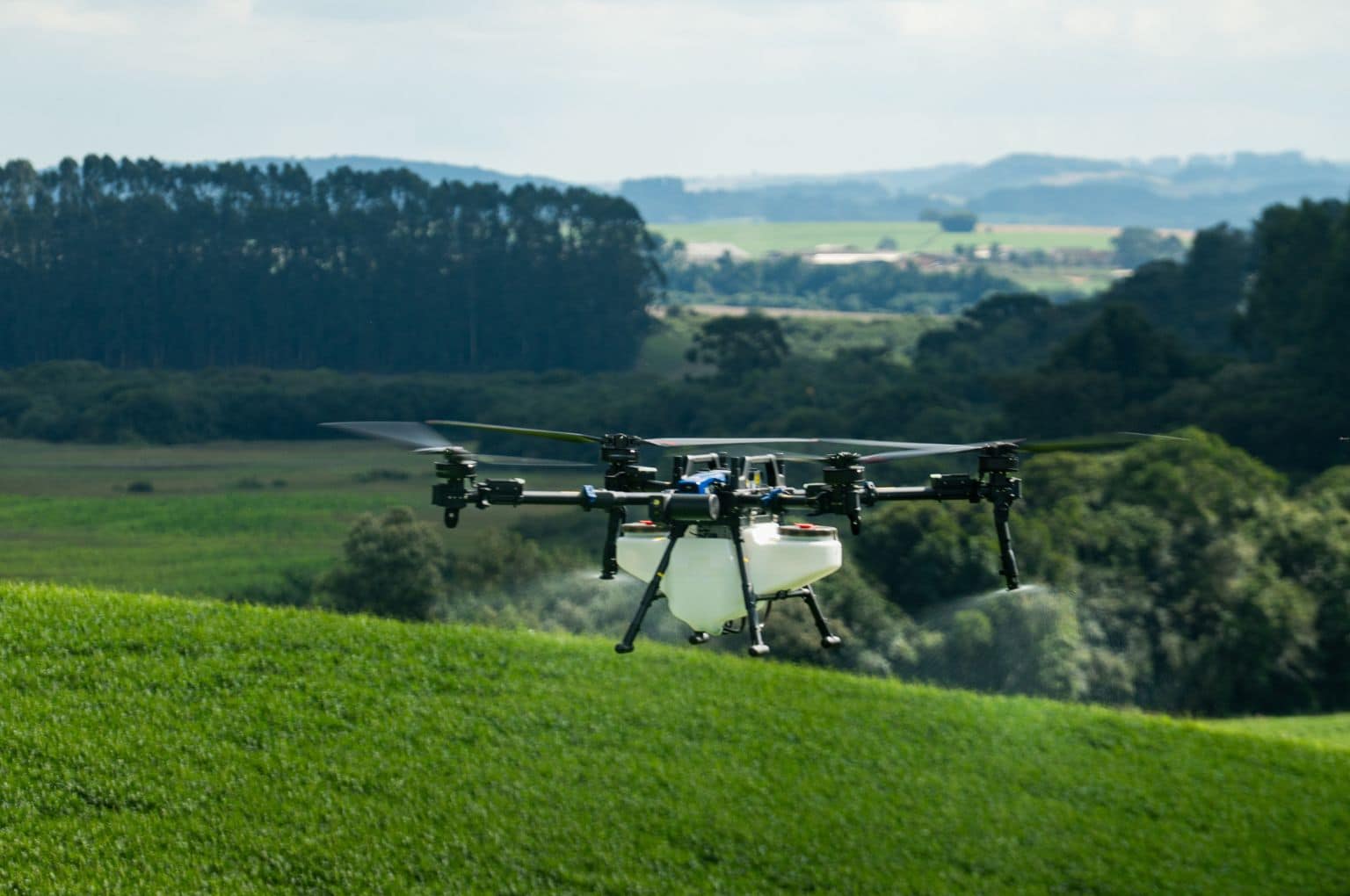 New Holland P spraying drone