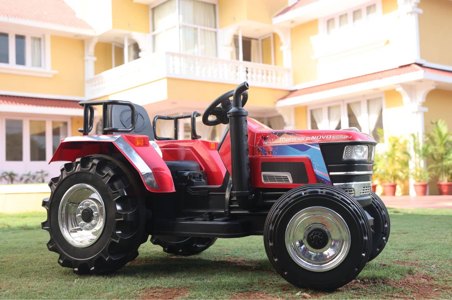 Electric Mahindra NOVO toy farm tractor