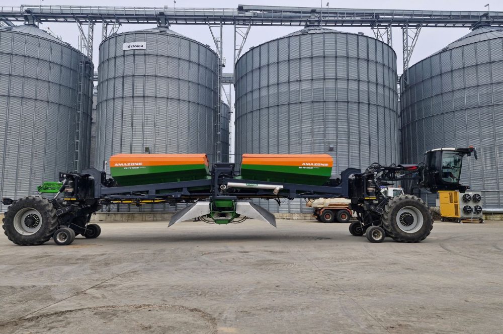 Nexat - Amazone spreader combination in transport mode at Terracult yard in Romania